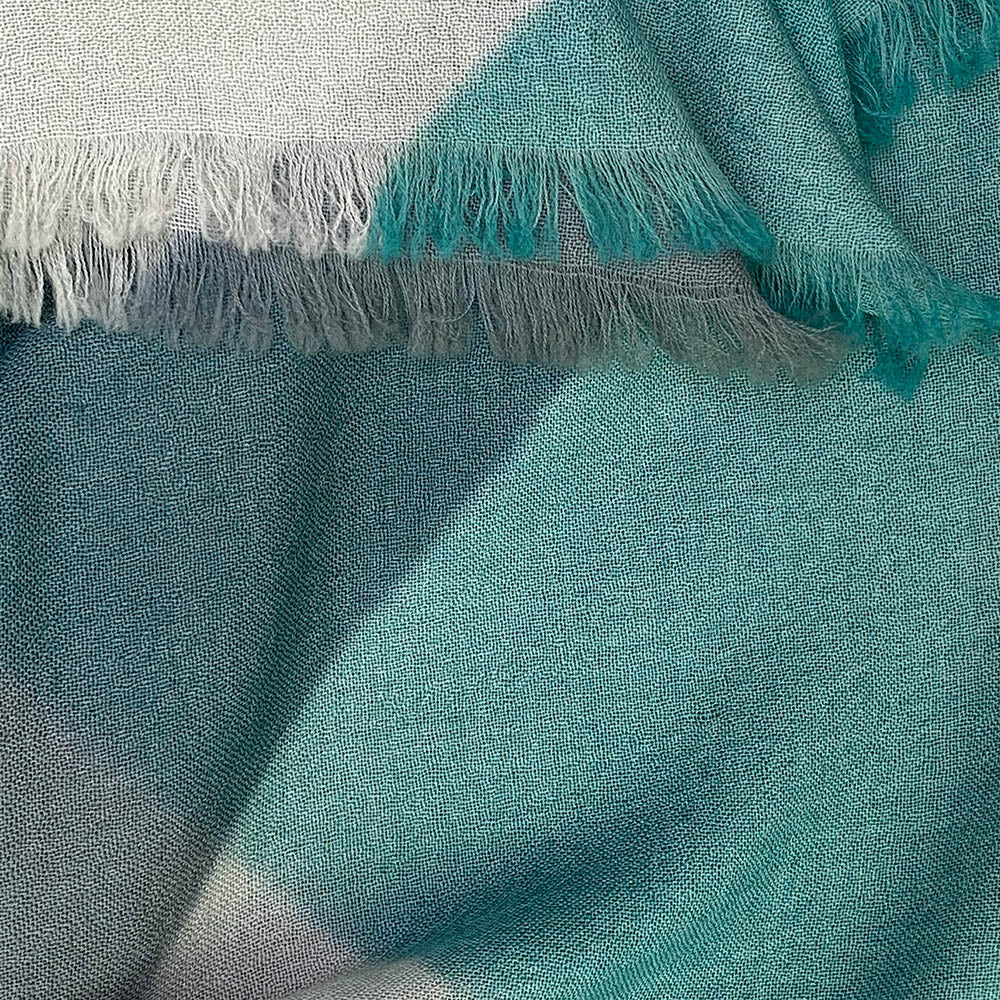 Echarpe lana shibori escocés diagonal turquesa